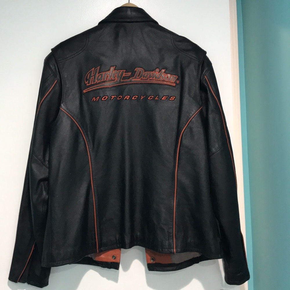 Black & orange Harley Davidson leather riding
